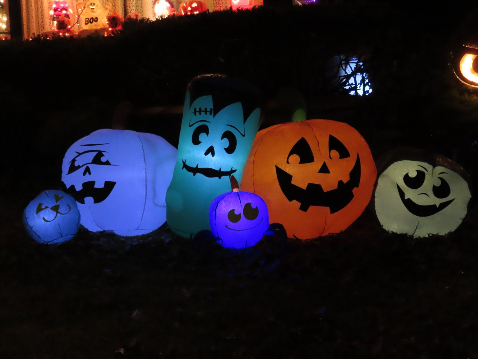 Colorful blow up jack-o-lanterns.